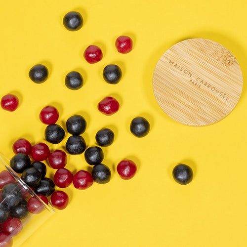 Candy box of blackcurrant and raspberry sugared candies