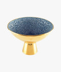 Gold and blue fruit bowl on foot