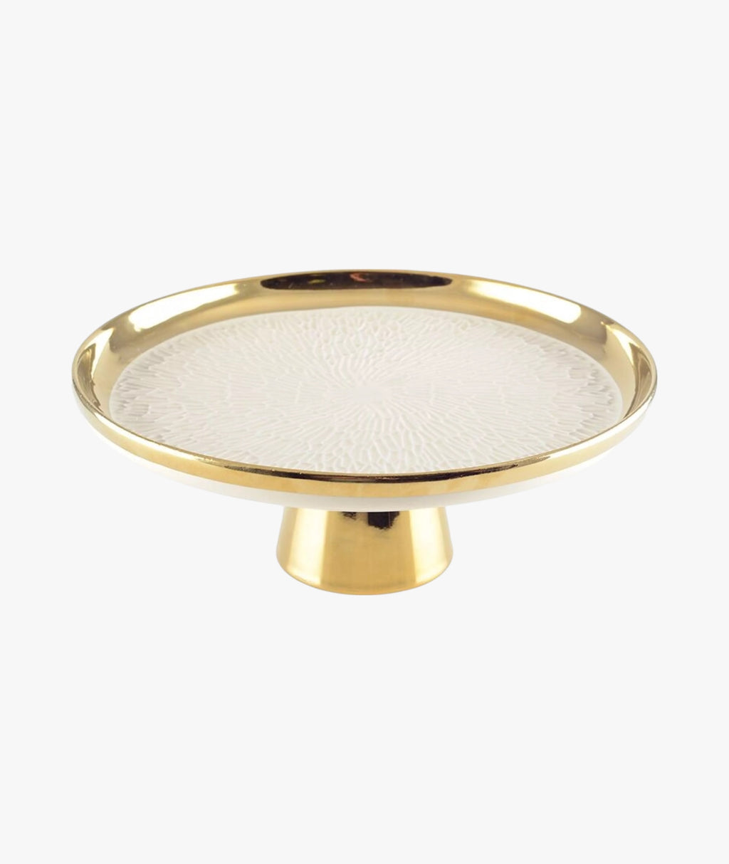 Plat à tarte sur pied crème avec bord doré